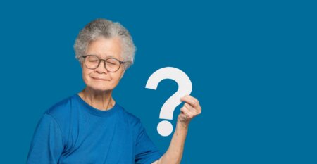 Question,Mark,Concept.,An,Elderly,Asian,Woman,With,Short,White